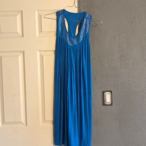 Never been worn. Blue beach dress.